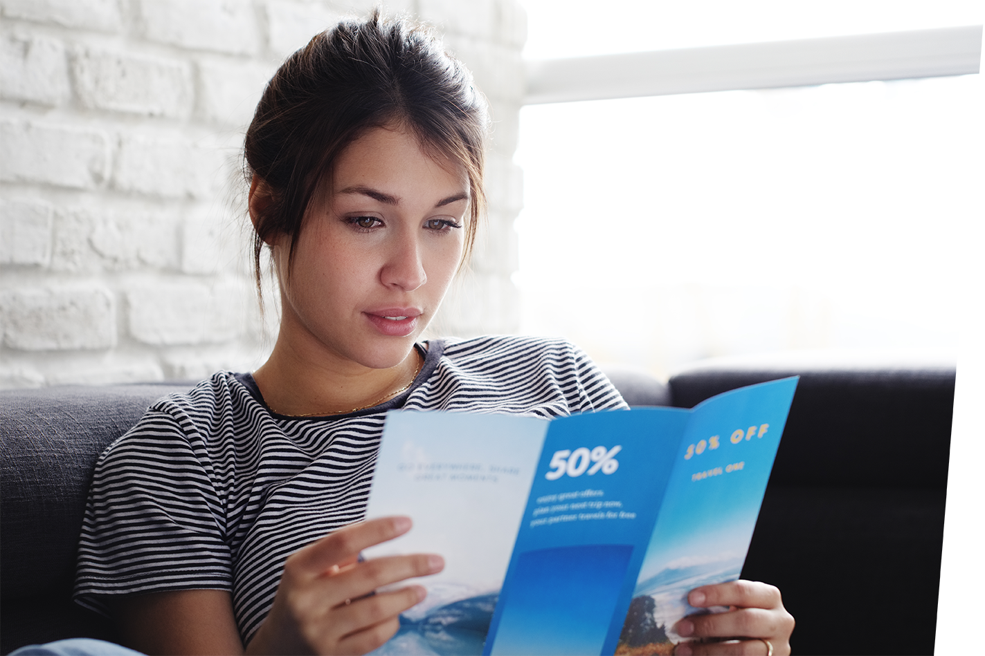 Girl Reading Brochure